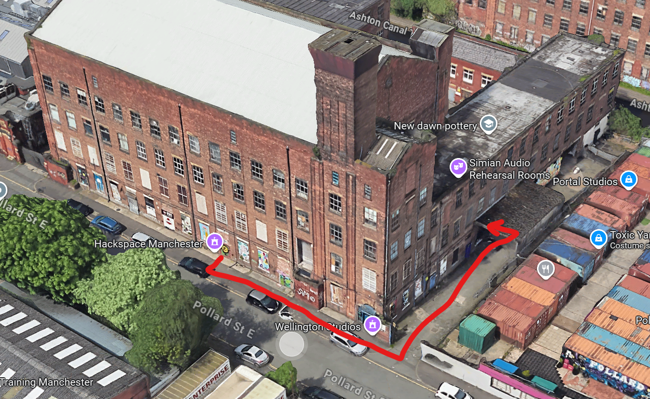 The building bins are around the side of the building